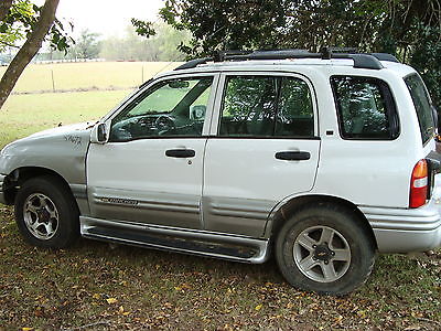 Chevrolet : Tracker lx engine runs awesome low miles needs minor work it white 4 door leather seat