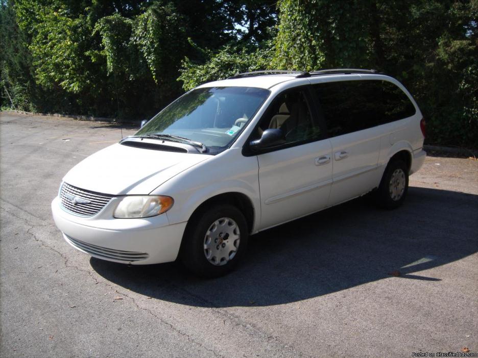 02 chrysler town and country lx van/ safe and depenable !!