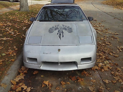 Pontiac : Fiero GT silver, 2.8V6, 4 speed, comes with extra batching body panels and 5 speed trans