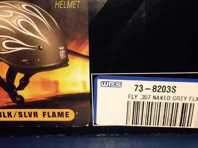 Helmet with flames new in box, 2