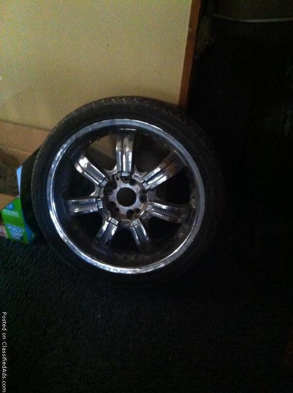 4 low profile tires and rims, 0