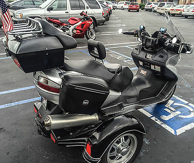 Suzuki : Other It's silver modified scooter has a black trike kit & black front finder