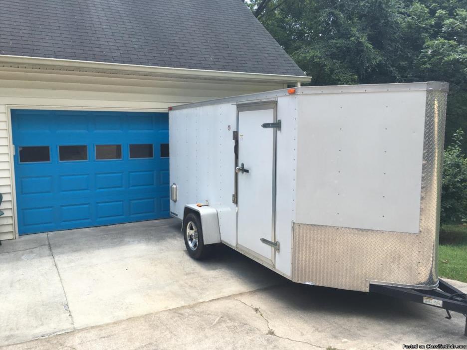 Enclosed trailer w/cabinets & 2 sets motorcycle rings